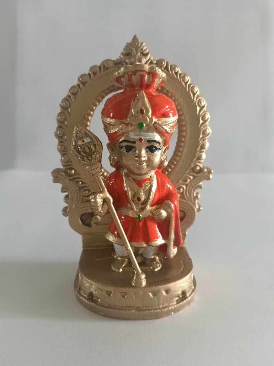 STONE ORANGE BABY MURUGAN STATUE